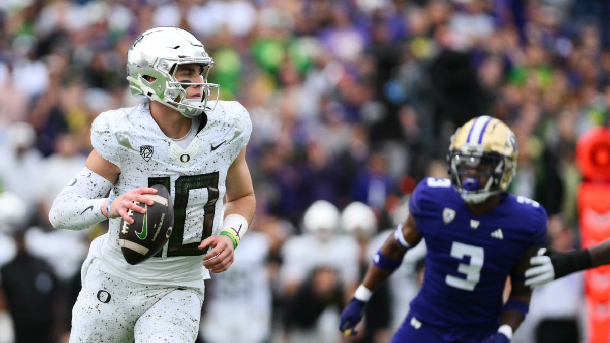 Oct 14, 2023; Seattle, Washington, USA; Oregon Ducks quarterback Bo Nix (10) looks to pass the ball during the first half against the Washington Huskies at Alaska Airlines Field at Husky Stadium.